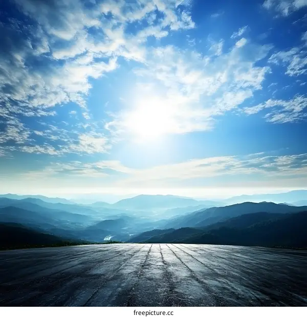 Scenic Mountain View with Concrete Road