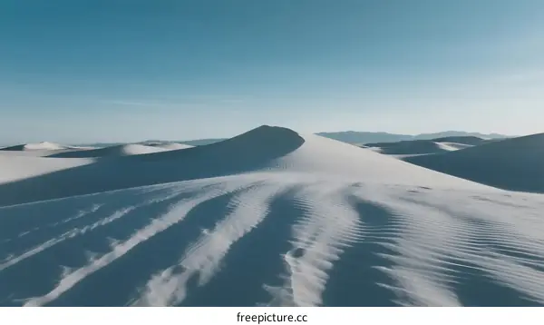 Vast White Sand Dunes Under Clear Blue Sky