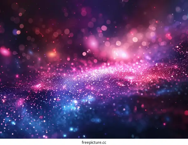 Glowing pink and blue sparkles on a dark purple background