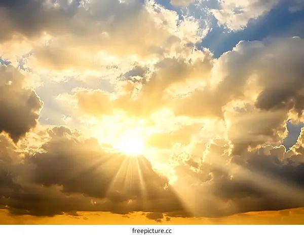 Golden Rays of Sunlight Breaking Through Clouds