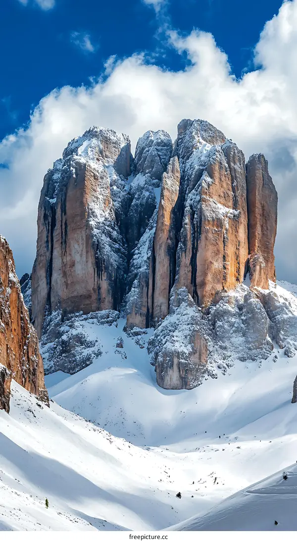 Snowy Mountains with Blue Sky and Clouds