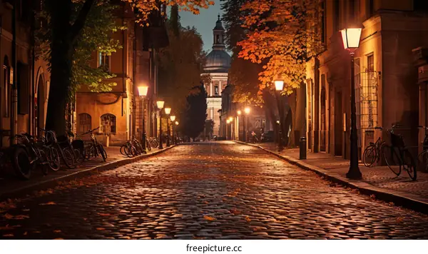 A cobblestone street in an old European city at dusk