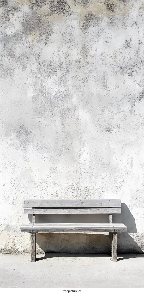 Rustic Wooden Bench Against White Wall