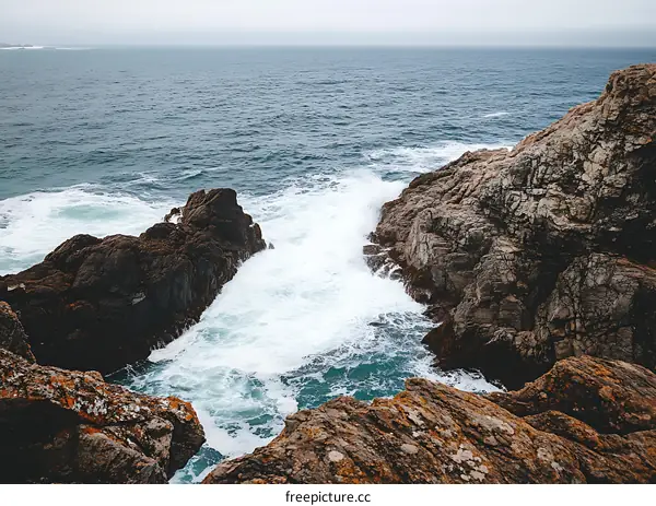 Ocean Waves Crashing Against Rocky Coastline