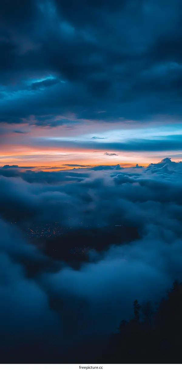 Aerial View Of Sunset Above The Clouds