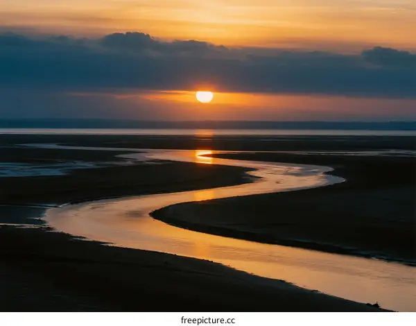 Beautiful Sunset Over a Winding River at Dusk