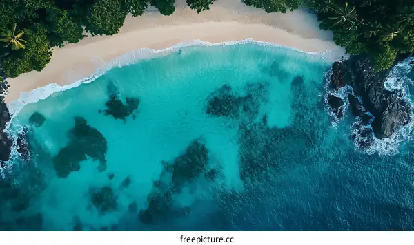 Aerial View of Clear Turquoise Water with White Sand Beach