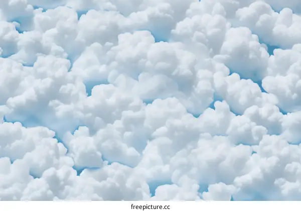 White clouds with a blue background