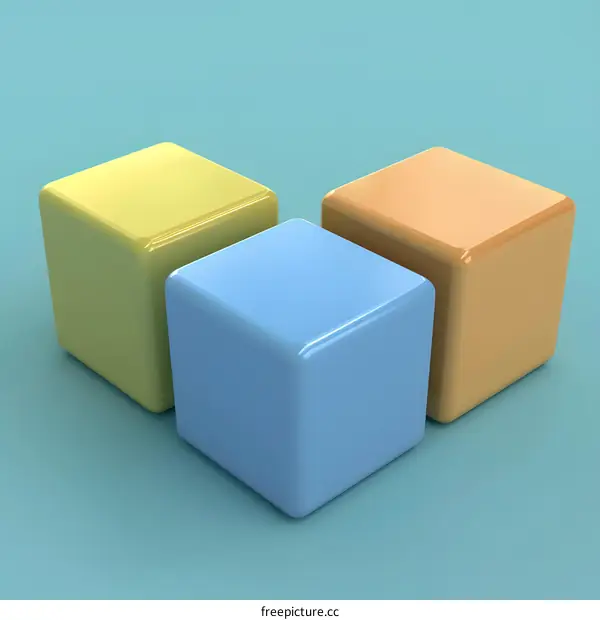 Three Color Cubes On Blue Background