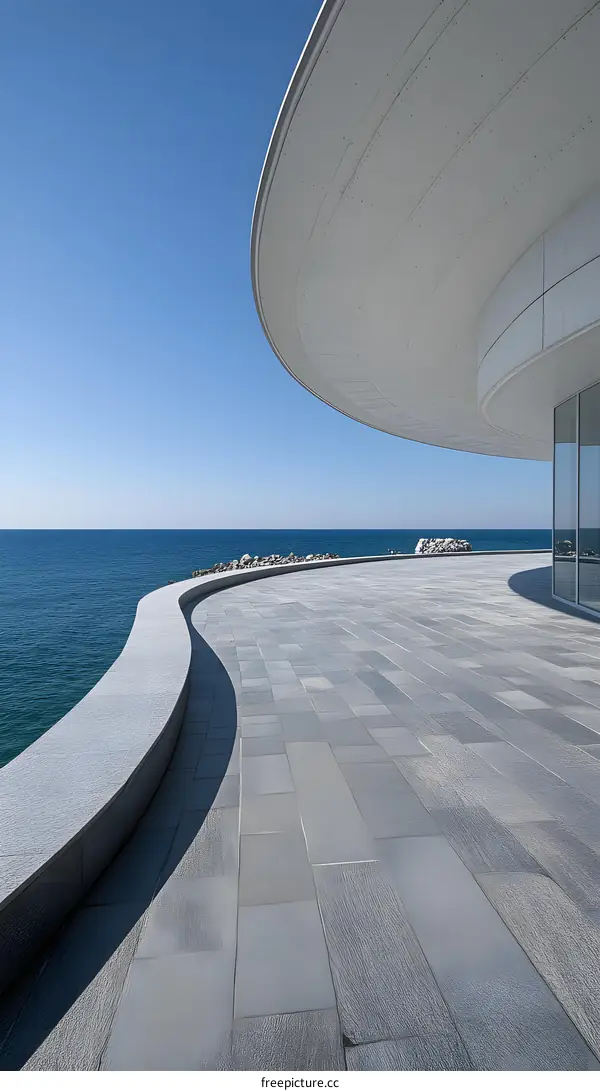 Modern Architecture by the Sea with Curved Lines