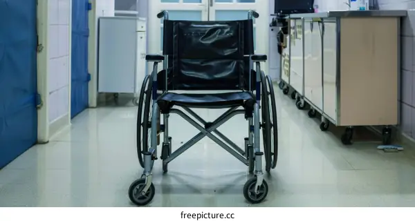 Empty Wheelchair in a Hospital Hallway