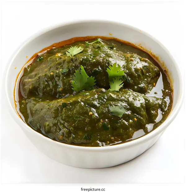 Green curry in a white bowl