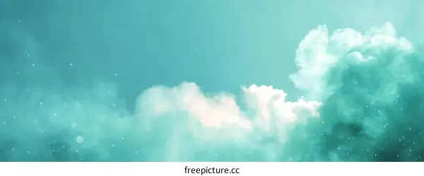 Vibrant Teal Sky with Fluffy Clouds