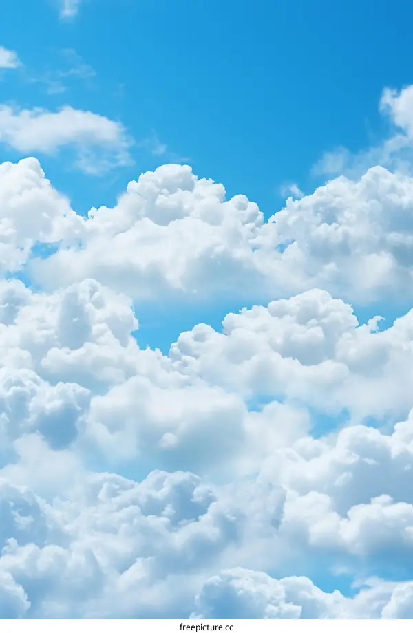 Stunning Blue Sky with Puffy Clouds Background