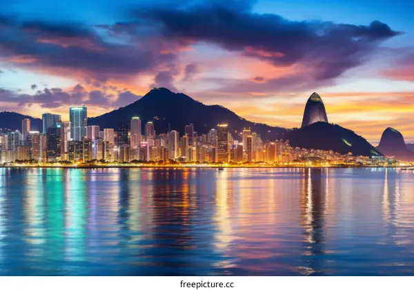Sugarloaf Mountain and Guanabara Bay illuminated at dusk, Rio de Janeiro, Brazil