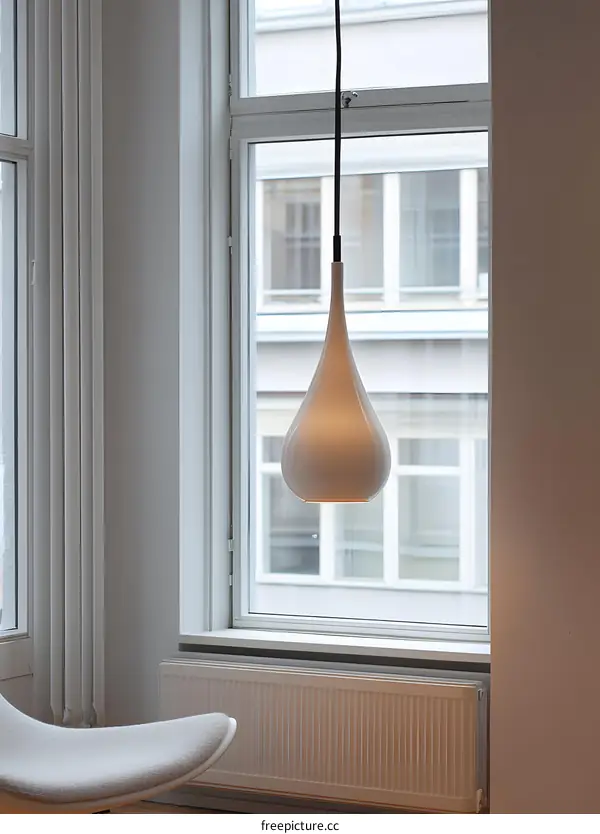 White Teardrop Pendant Light Hanging Near Window
