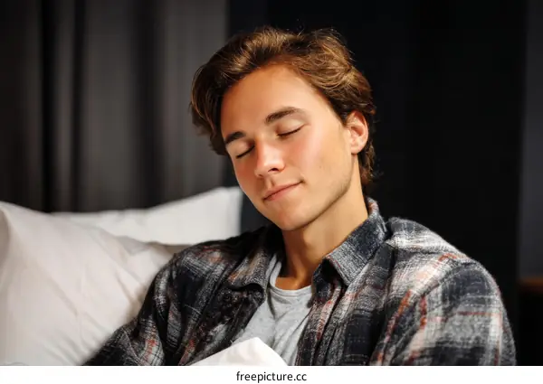 Close-up Teenager Sleeping on a Bed