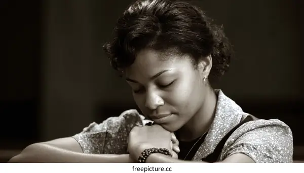 Portrait of a Woman in Prayerful Reflection