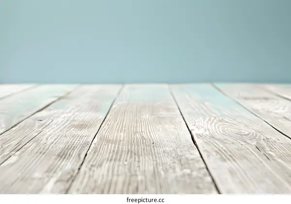 Whitewashed Wood Tabletop With Light Blue Background