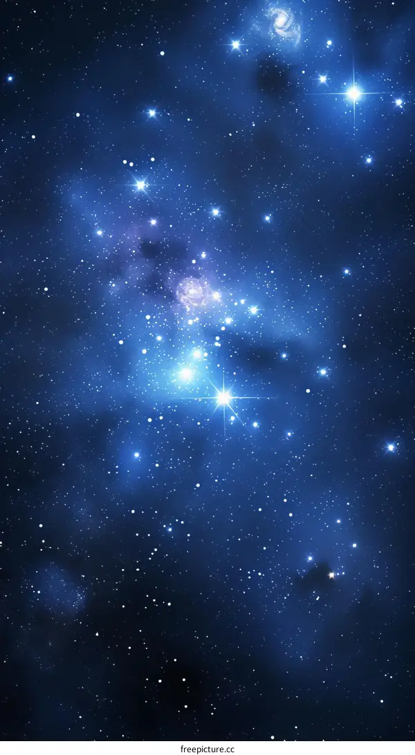 Blue starry night sky with bright shining stars and galaxies