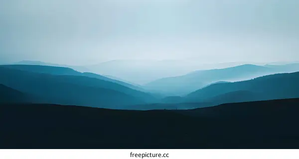 Layers of Blue Mountains in Foggy Landscape