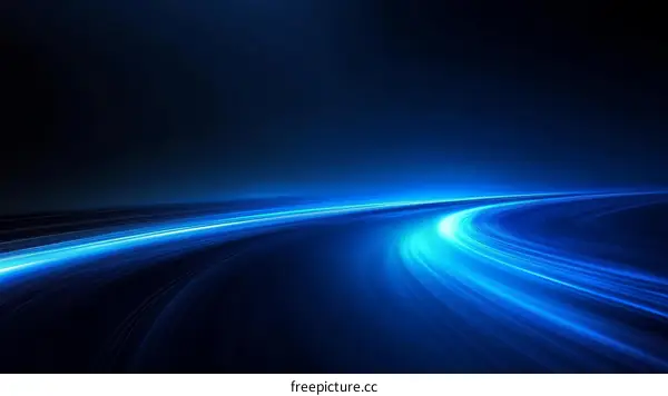 Abstract Blue Light Trails on a Dark Background