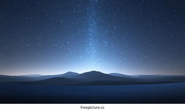 Starry Night Over a Vast Landscape