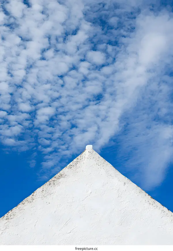 White Wall and Blue Sky with Clouds