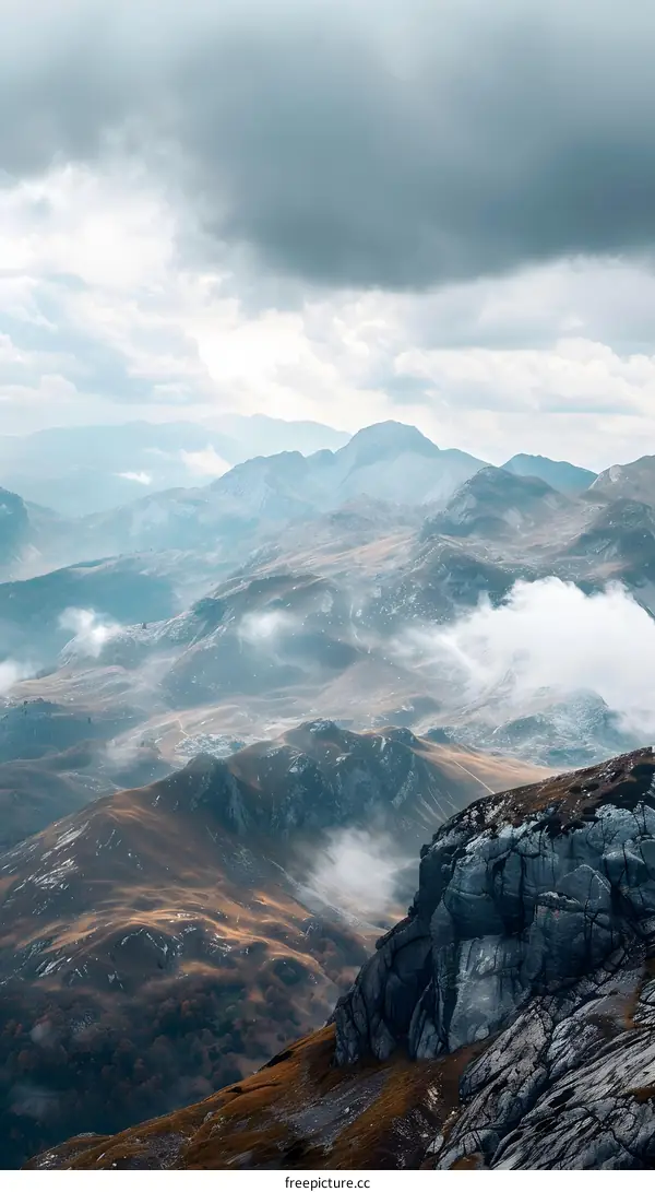 Aerial View of Misty Mountains in the Clouds