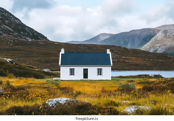 White Cottage in a Mountainous Landscape