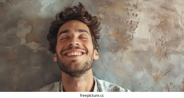 Happy Caucasian Man Lying on the Floor