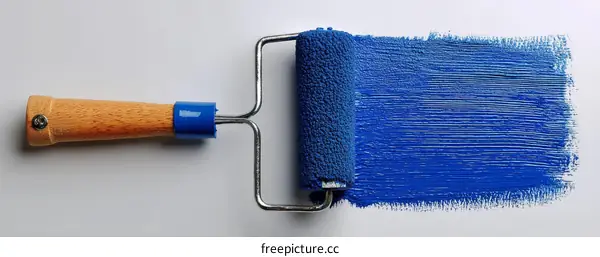 Paint Roller and Blue Paint Stroke