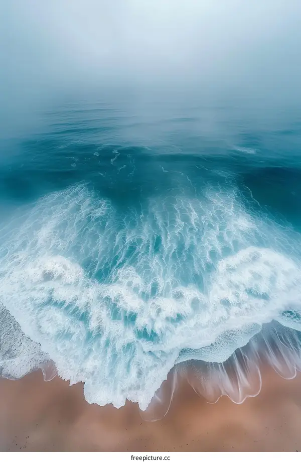 Huge Ocean Wave About to Crash on Sandy Beach