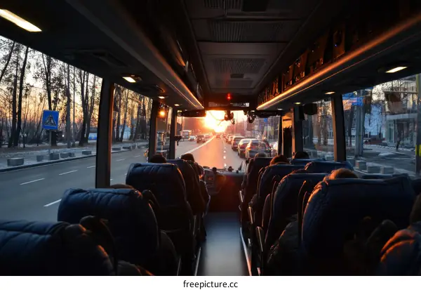 Bus Journey at Sunset Through City
