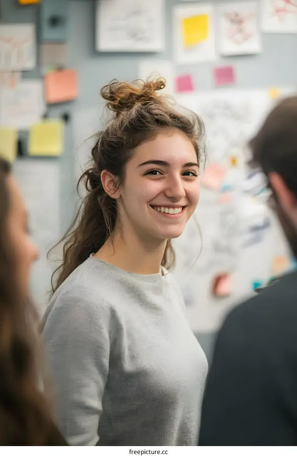 Smiling Woman with Bun in Her Hair