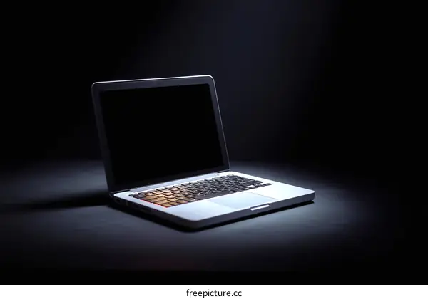 Stylish Laptop in Dark Studio Lighting