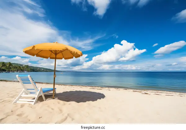 Beach scene with yellow umbrella and white lounge chair