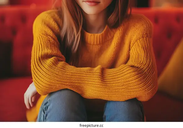 Close Up Of Woman Wearing Yellow Knit Sweater