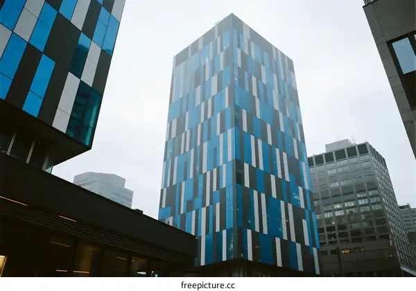 Modern Multi-colored Glass Building in Urban Area