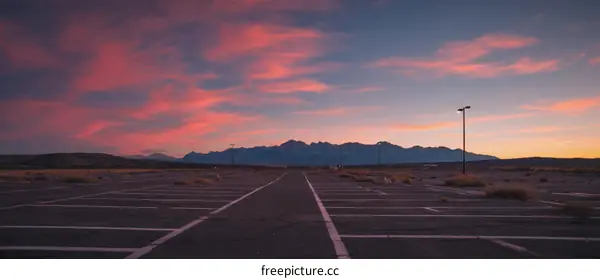 Empty Desert Parking Lot at Sunset