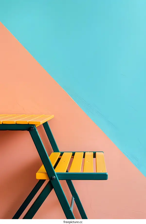 Minimalist Green Chair with Yellow Seat and Backrest against a Blue and Peach Wall