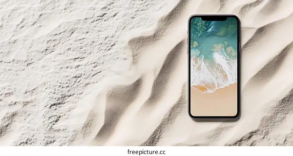 Smartphone on Beach Sand with Ocean Background