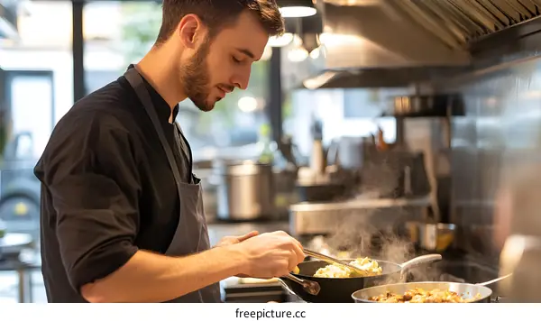 Chef Cooking in Restaurant Kitchen