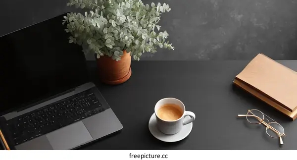 Modern Workspace with Laptop and Coffee