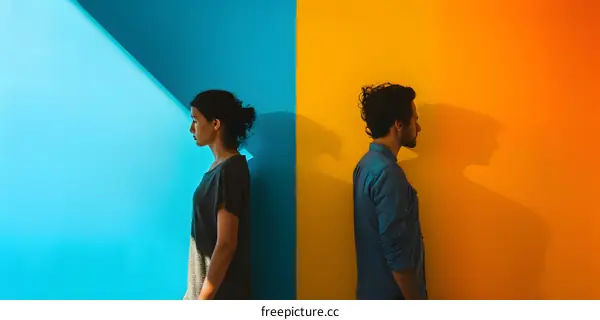 Couple Divided by Colorful Wall