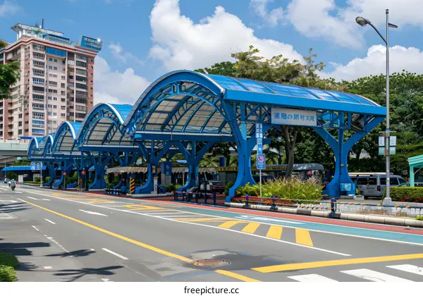 Modern Blue Bus Stop Shelter in City