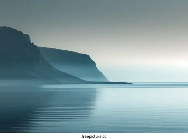 Misty Mountains and Calm Sea