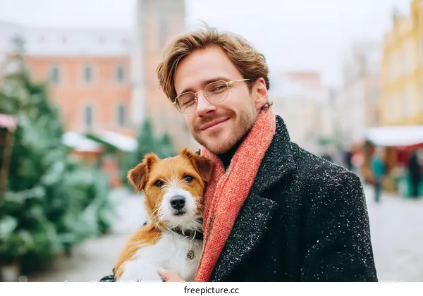Man and Dog Enjoying a Festive Winter Day