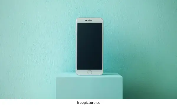 Stylish Modern Smartphone on Teal Display