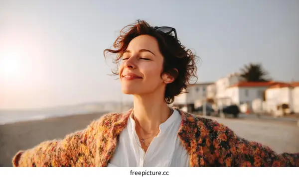 Woman enjoying the beach sunset